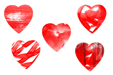 Red paint hearts over white backgroundの写真素材