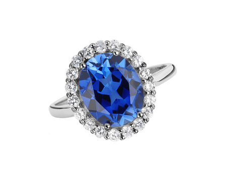 beautiful ring with blue gem (stone) isolated on white backgroundの写真素材