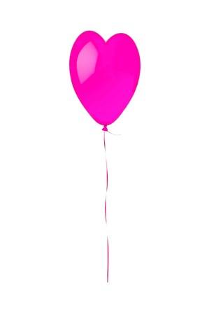 Pink flying balloon looking like heart symbol isolated on white backgroundの写真素材