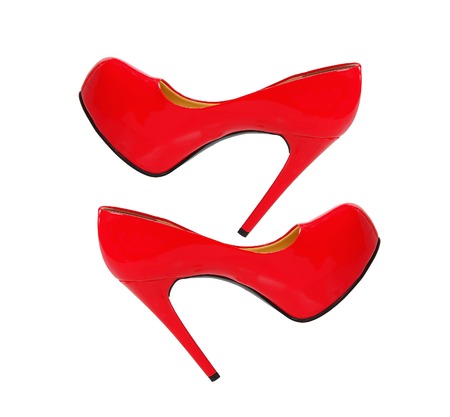red high heeled woman shoes isolated on white の写真素材