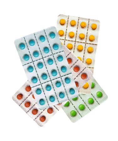 Tablets pills isolated on white の写真素材