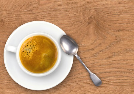 Cup of coffee on wooden backgroundの写真素材