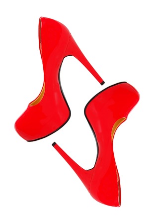red high heels woman shoes isolated on white backgroundの写真素材