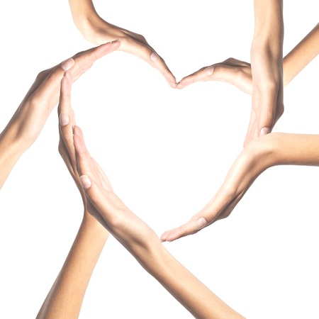 Human hands in heart shape isolated on white backgroundの写真素材