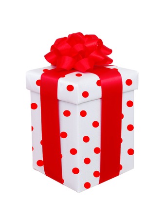white polka dot present box with red bow isolated の写真素材