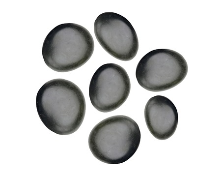 Black spa stones isolated on whiteの写真素材
