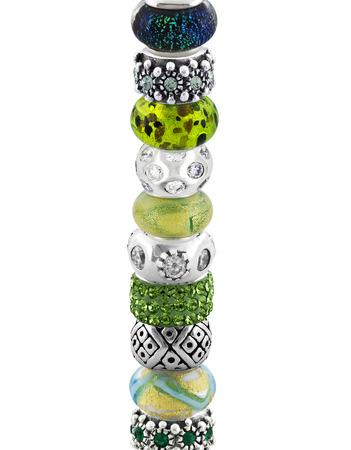 Beautiful silver bracelet with precious stones isolated on white の写真素材