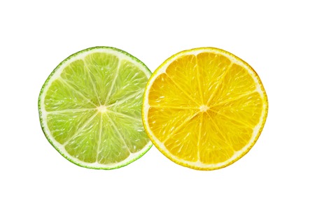 Lemon and lime slices isolated on white backgroundの写真素材