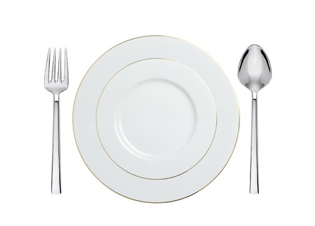 white plate, spoon and fork isolated on whiteの写真素材
