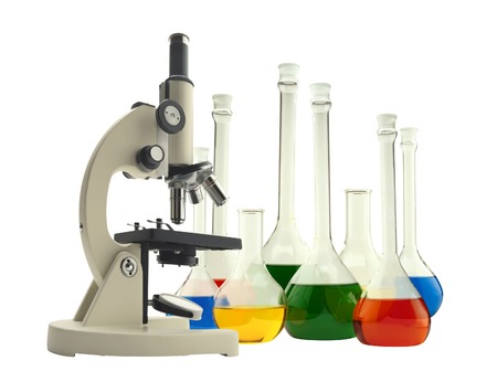 Laboratory metal microscope and test tubes with liquid isolated on whiteの写真素材