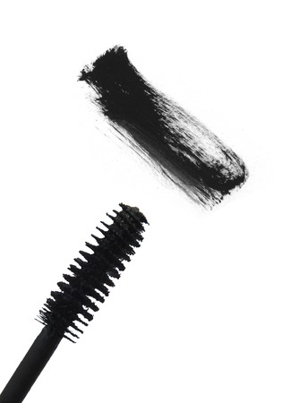 Black mascara brush stroke isolated on whiteの写真素材
