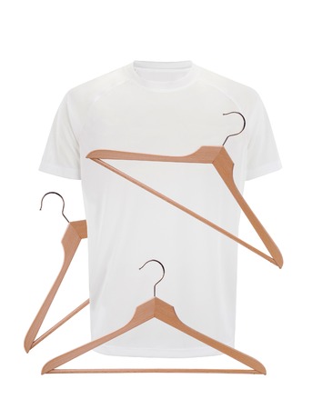 White t-shirt and wooden hangers isolated on white backgroundの写真素材