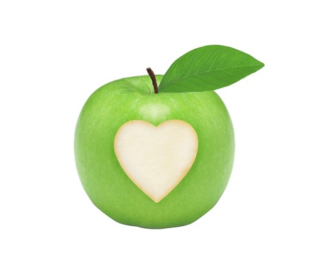 Fresh green apple with heart isolated on white backgroundの写真素材