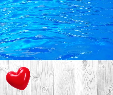 Swimming pool and wooden deck ideal for backgroundsの写真素材