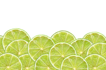 fresh lime slices on white backgroundの写真素材