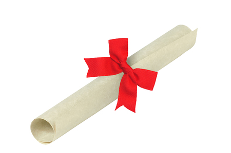 Graduation diploma with red ribbon isolated on white background. Symbol of successful graduationの写真素材