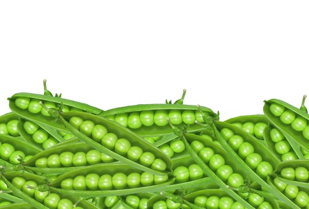 fresh green peas isolated on white backgroundの写真素材