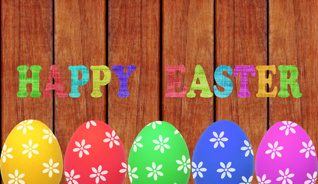 Easter eggs on wooden table background