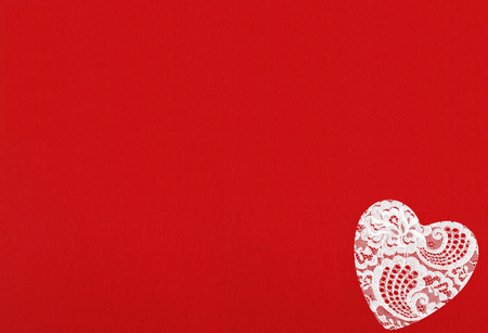 Red Felt Background and Lace Heart for design to Valentine's Dayの写真素材