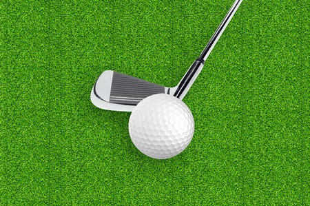 golf ball on the golf course green grassの写真素材