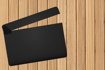 Movie clapper on wooden backgroundの写真素材