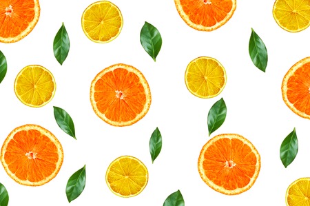 Citrus fruits orange and lemon with green leaves on white. Flat lay, top viewの写真素材