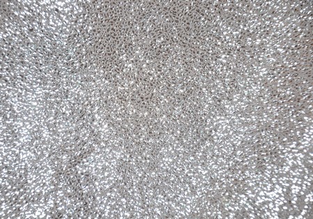 Silver Christmas Glittering background. Holiday abstract texture Festive background with defocusedの写真素材