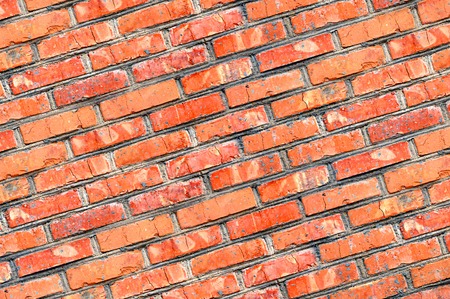 Old Orange Brick Wall Backgroundの写真素材