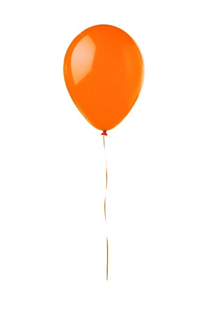 Orange flying balloon isolated on white backgroundの写真素材