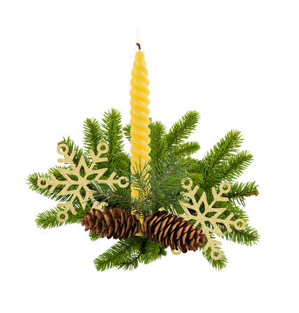 Green Christmas Fir Tree Branch with Cones and Candle isolated on White like Christmas Decor Compositionの写真素材