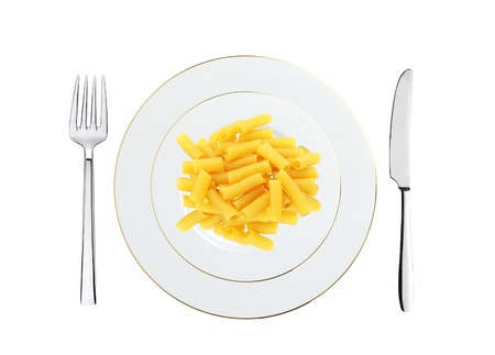 Delicious pasta with pesto on plate isolated on whiteの写真素材