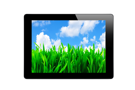Black Touch Screen Tablet with Blue Sky and Green Grass isolated on white backgroundの写真素材