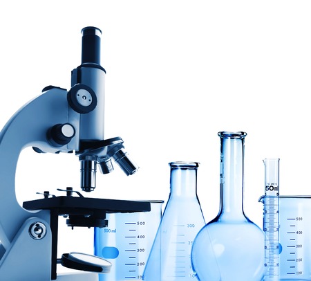 Laboratory metal microscope and test-tubes isolated on whiteの写真素材