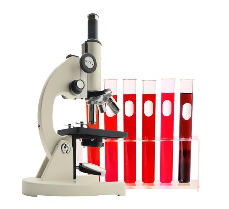 Laboratory metal microscope and test tubes with liquid isolated on whiteの写真素材