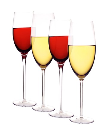 Wineglasses with white and red wine isolated on whiteの写真素材