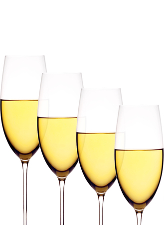 Wineglasses with white wine, isolated on whiteの写真素材