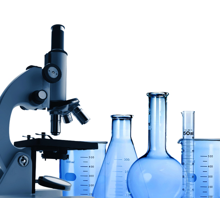 Laboratory metal microscope and test-tubes isolated on whiteの写真素材