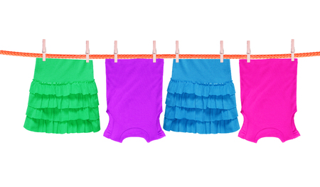 Laundry line with clothes isolated on white backgroundの写真素材