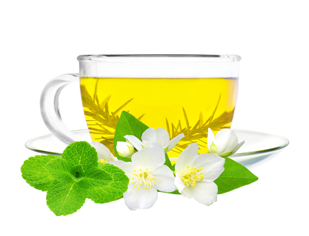 cup of green tea with jasmine flowers and mint herb isolated on whiteの写真素材