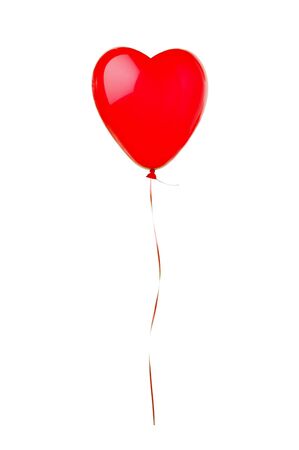Red flying balloon isolated on white backgroundの写真素材