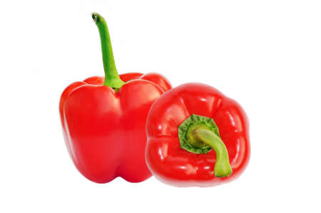 Two red sweet paprika peppers top view isolated on white for design packagingの写真素材