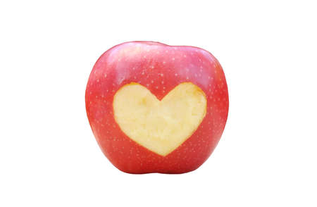 red apple with heart symbol isolated on white background for designの写真素材