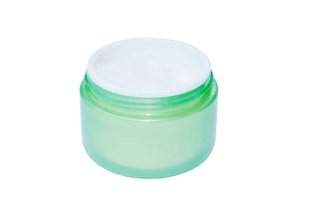 Cosmetic glass jar with face cream isolated on white backgroundの写真素材