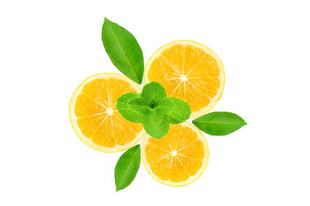 yellow fresh lemon fruit slice with green leaves and mint herb isolated on the white backgroundの写真素材
