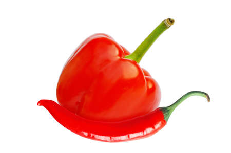 Red sweet paprika and hot chilly peppers isolated on white for design packagingの写真素材