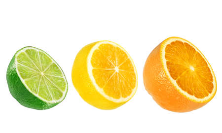 green fresh lime, yellow lemon and orange half isolated on the white backgroundの写真素材