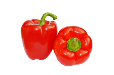 Two red sweet paprika peppers isolated on white for design packagingの写真素材