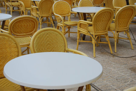 beer garden with empty chairsの写真素材