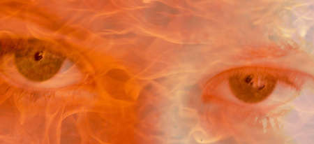 scary close up shoot of flame eyesの写真素材