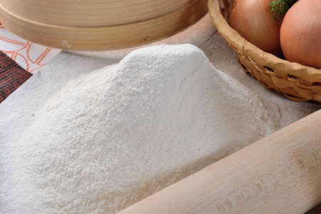 Cooked meal for baking and other ingredients on the tableの写真素材